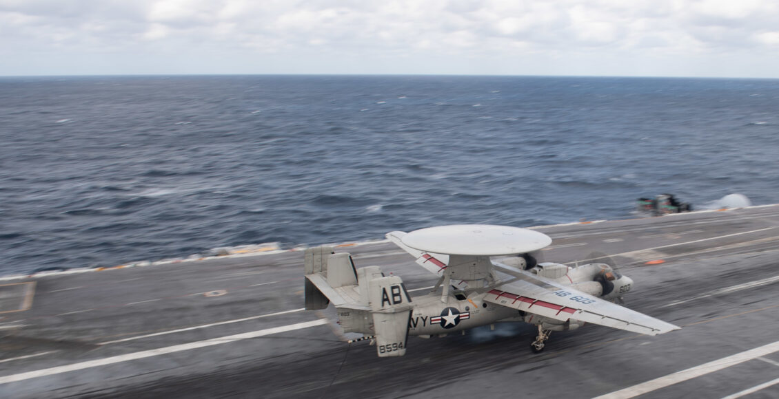 An E-2C Hawkeye, assigned to Carrier Airborne Early Warning Squadron (VAW) 126, lands on the flight deck of the aircraft carrier USS John C. Stennis (CVN 74) in the Atlantic Ocean